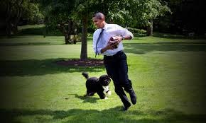 President Obama is chased by his pup